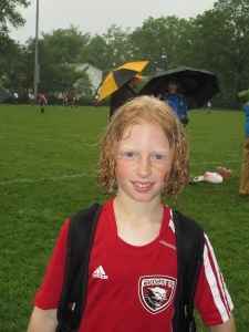 kids soccer in rain