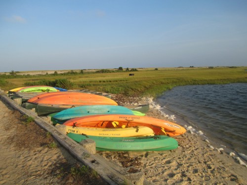 Kayaks parked at Chappaquiddick beach, Martha's Vineyard on carpoolcandy.com
