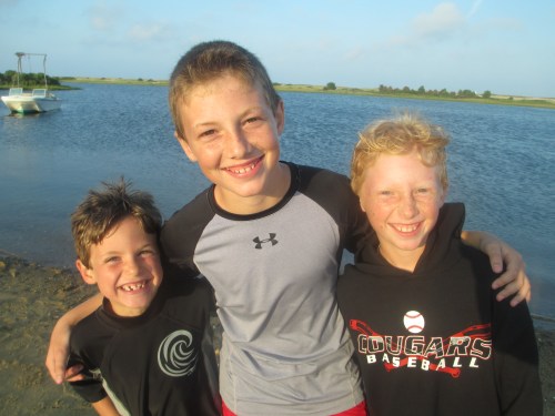 Boys smiling on Chappaquiddick, Martha's Vineyard on carpoolcandy.com