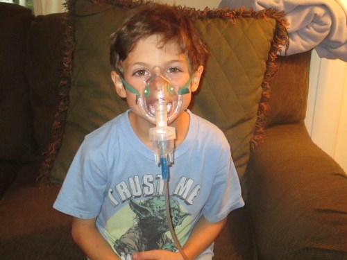 kid using nebulizer on carpoolcandy.com