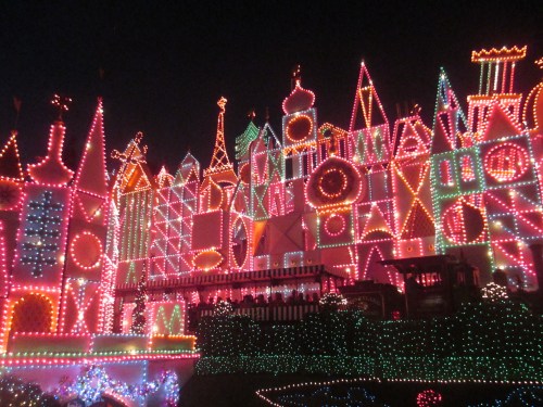 Small World lit up at night at Disneyland on carpoolcandy.com