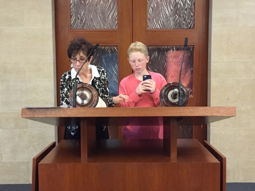 Aden practicing torah reading with our cantor